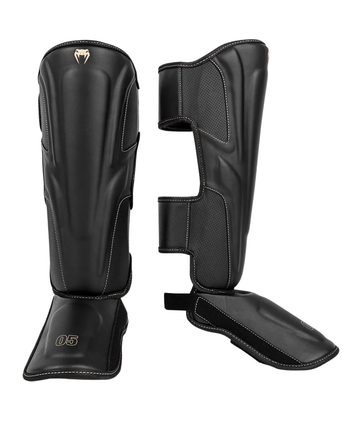 Venum Scheenbeschermers Impact Evo Zwart