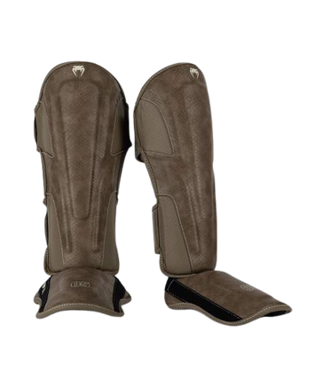 Venum Scheenbeschermers Impact Evo Scales Bruin